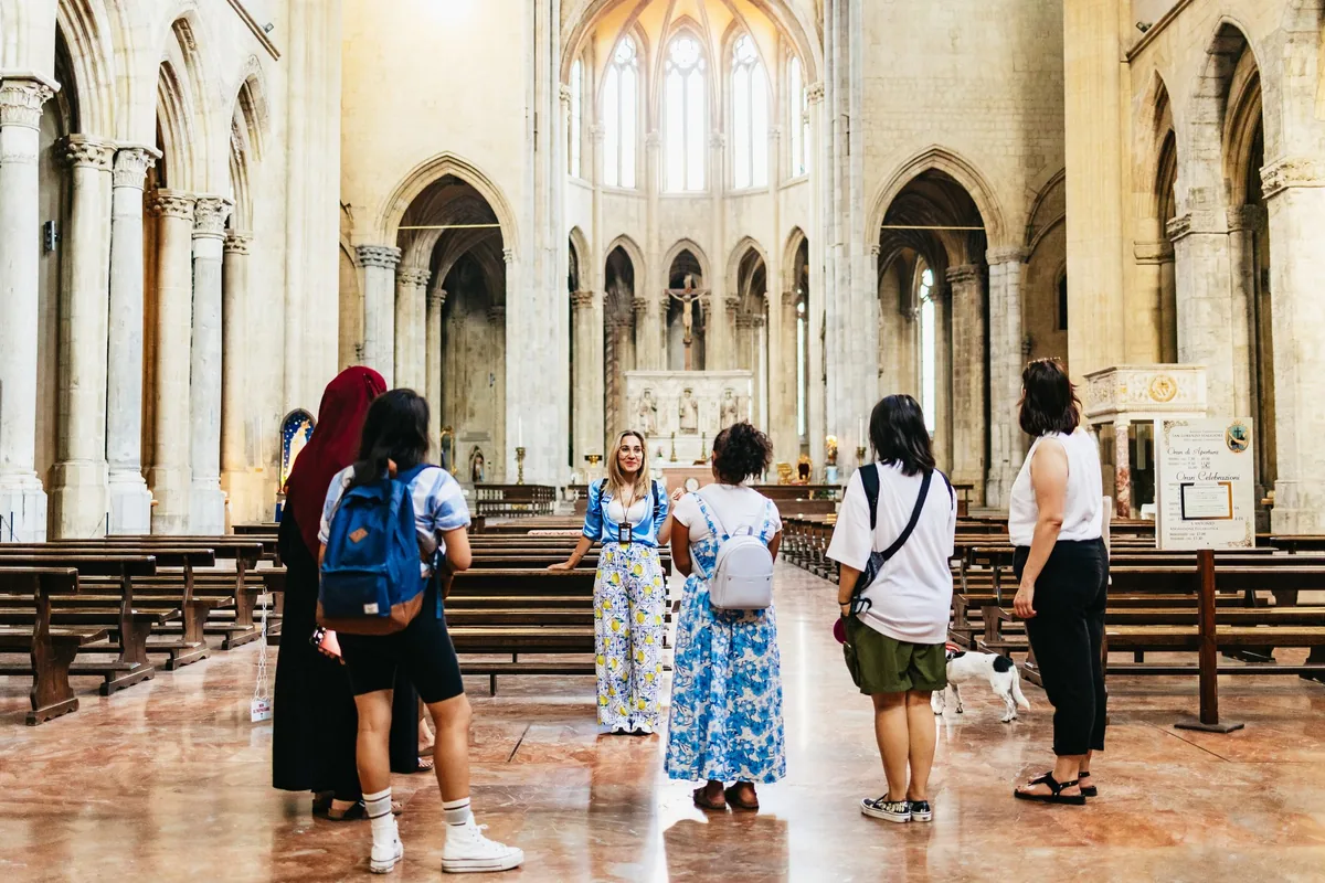 A guided visit inside a Naples church